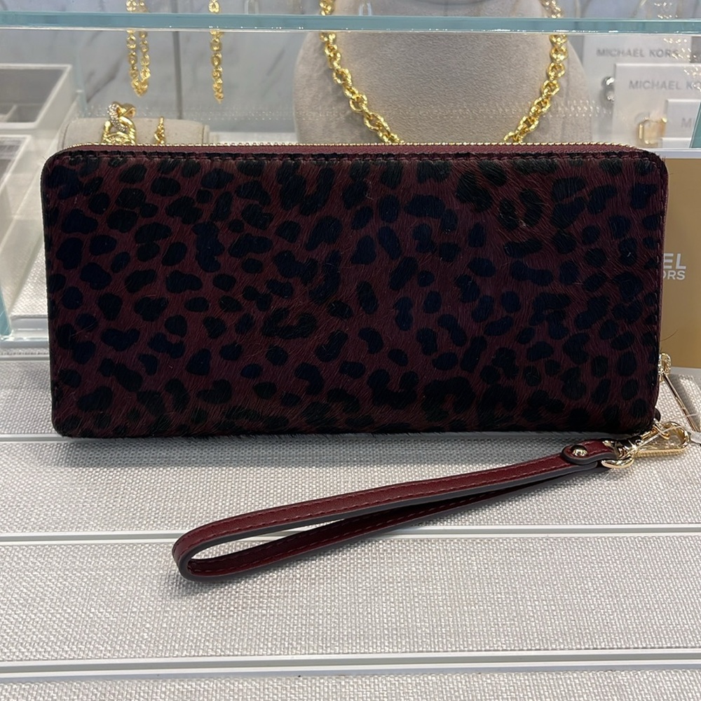 MICHAEL KORS
Leather Lg Continental Wristlet Phone Wallet Exotic Print Hair Culf - Picture 6 of 16